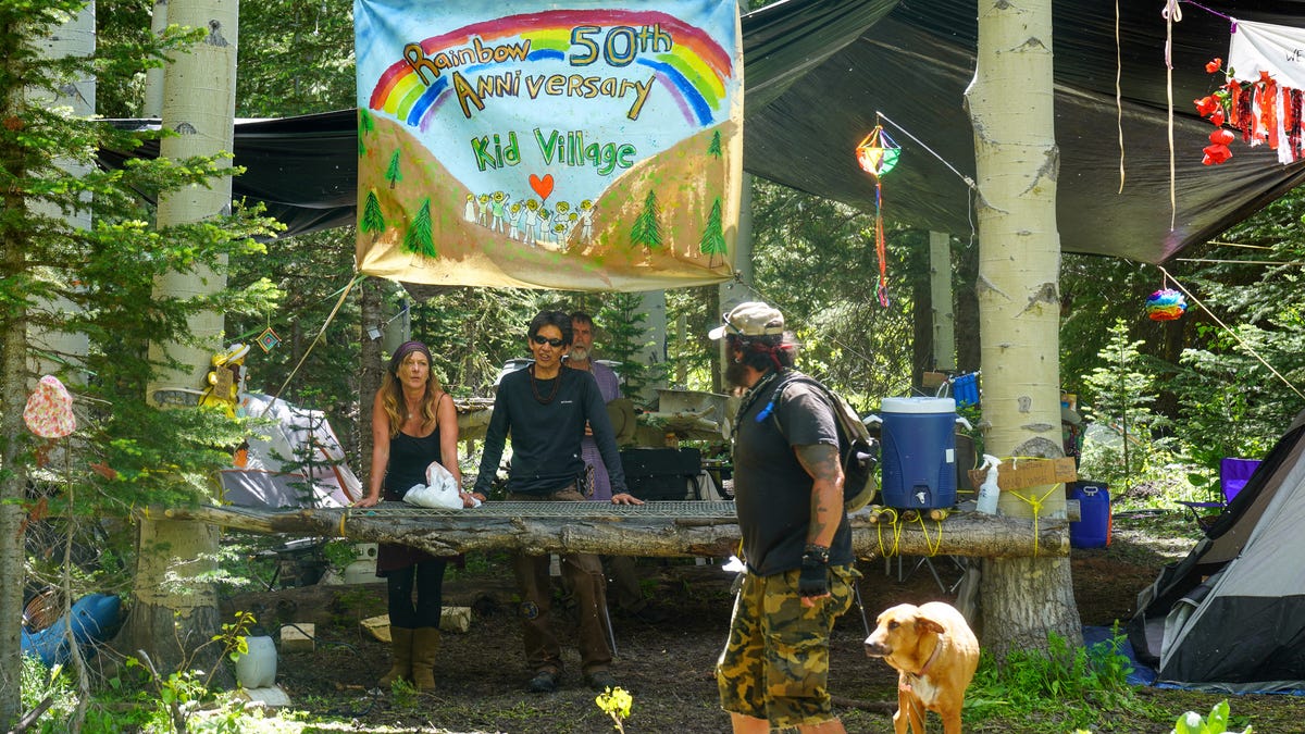 June 26, 2022; Craig, CO, USA; Members of the Kid Village camp at the annual Rainbow Family gathering say goodbye to a fellow attendee in the days prior to the main campout beginning. Mandatory Credit: Trevor Hughes-USA TODAY NETWORK