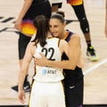Caitlin Clark and Diana Taurasi share hug before tip-off of Fever vs Mercury