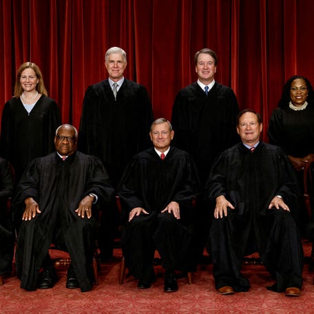 Supreme Court justices pose for their group portrait at the Supreme Court in Washington, U.S., October 7, 2022. Seated (L-R): Justices Sonia Sotomayor, Clarence Thomas, Chief Justice John G. Roberts, Jr., Samuel A. Alito, Jr. and Elena Kagan. Standing (L-R): Justices Amy Coney Barrett, Neil M. Gorsuch, Brett M. Kavanaugh and Ketanji Brown Jackson.