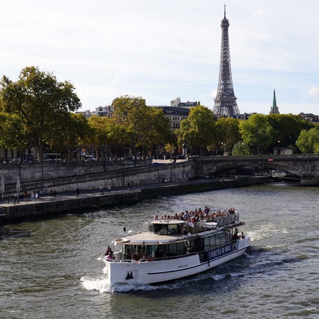 Oct 22, 2022; Paris, FRANCE; General view the Eiffel Tower and the Seine river, as seen from Pont Alexandre III in advance of the Paris 2024 Summer Olympic Games. The bridge will serve as the site for triathlon, open water swim