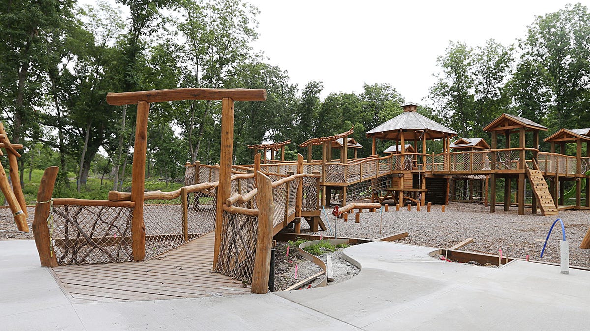 New inclusive Treehouse Village offers climbing wall, zipline, slides, accessible features