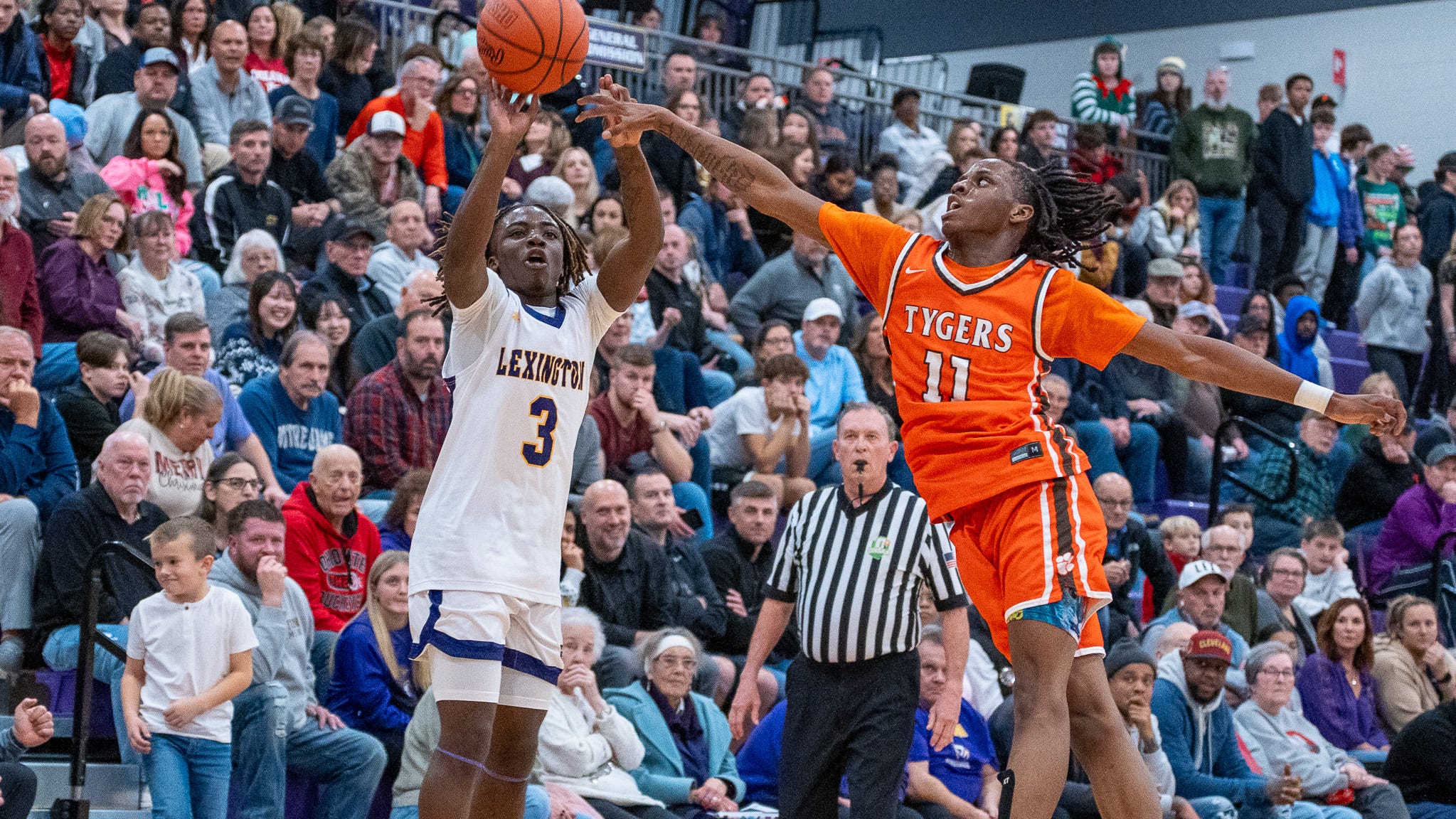 Minutemen withstand cold night at the foul line to beat Tygers