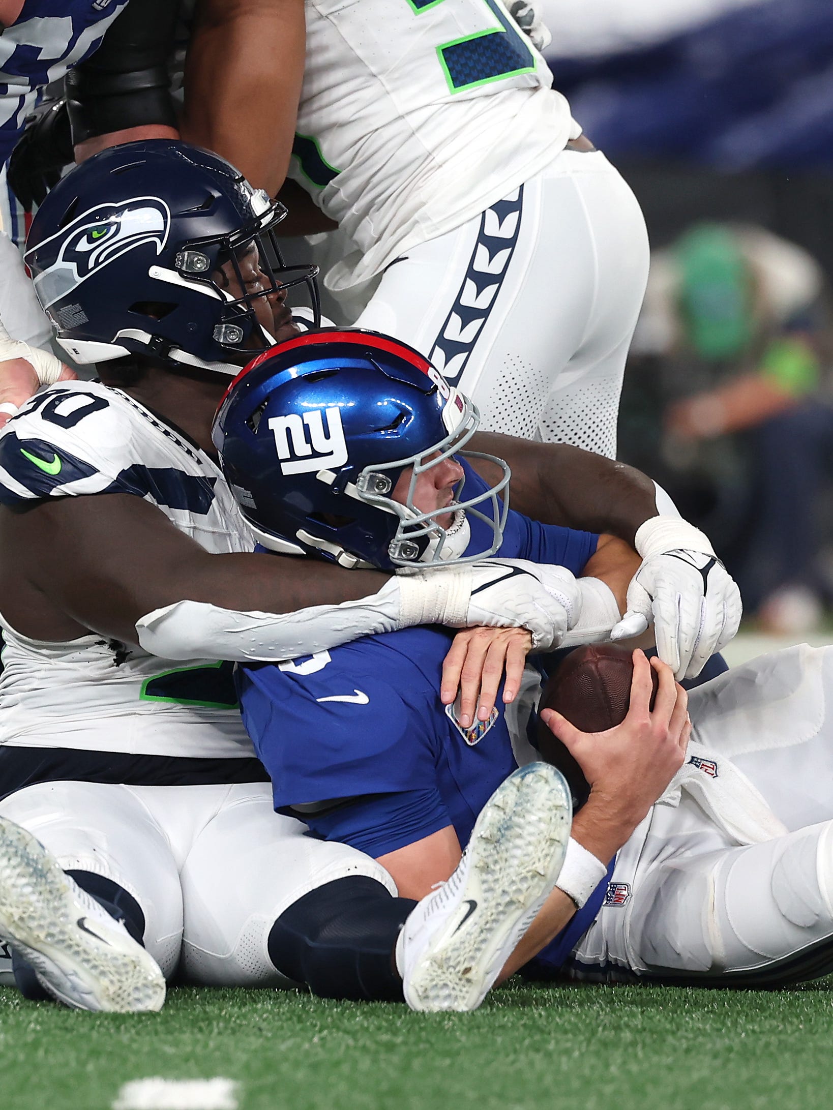 Seattle Seahawks' Seattle Seahawks Seattle Seahawks tight end Brandon  Williams (86) is tackled by Dallas Cowboys' Dallas Cowboys cornerback  Anthony Brown (30) and Dallas Cowboys inside linebacker Damien Wilson (57)  after catching