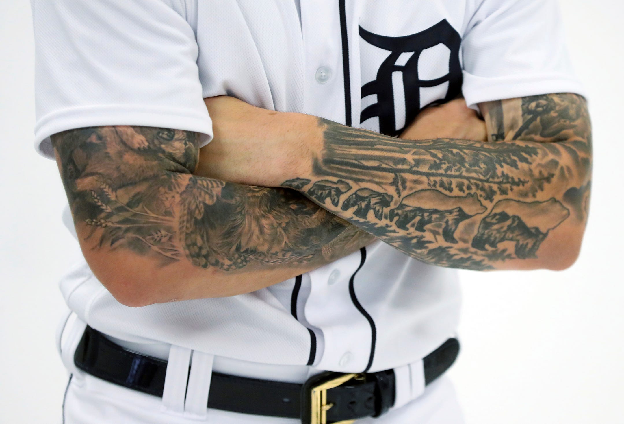 Tattoos seen in Detroit Tigers clubhouse reveal interesting stories