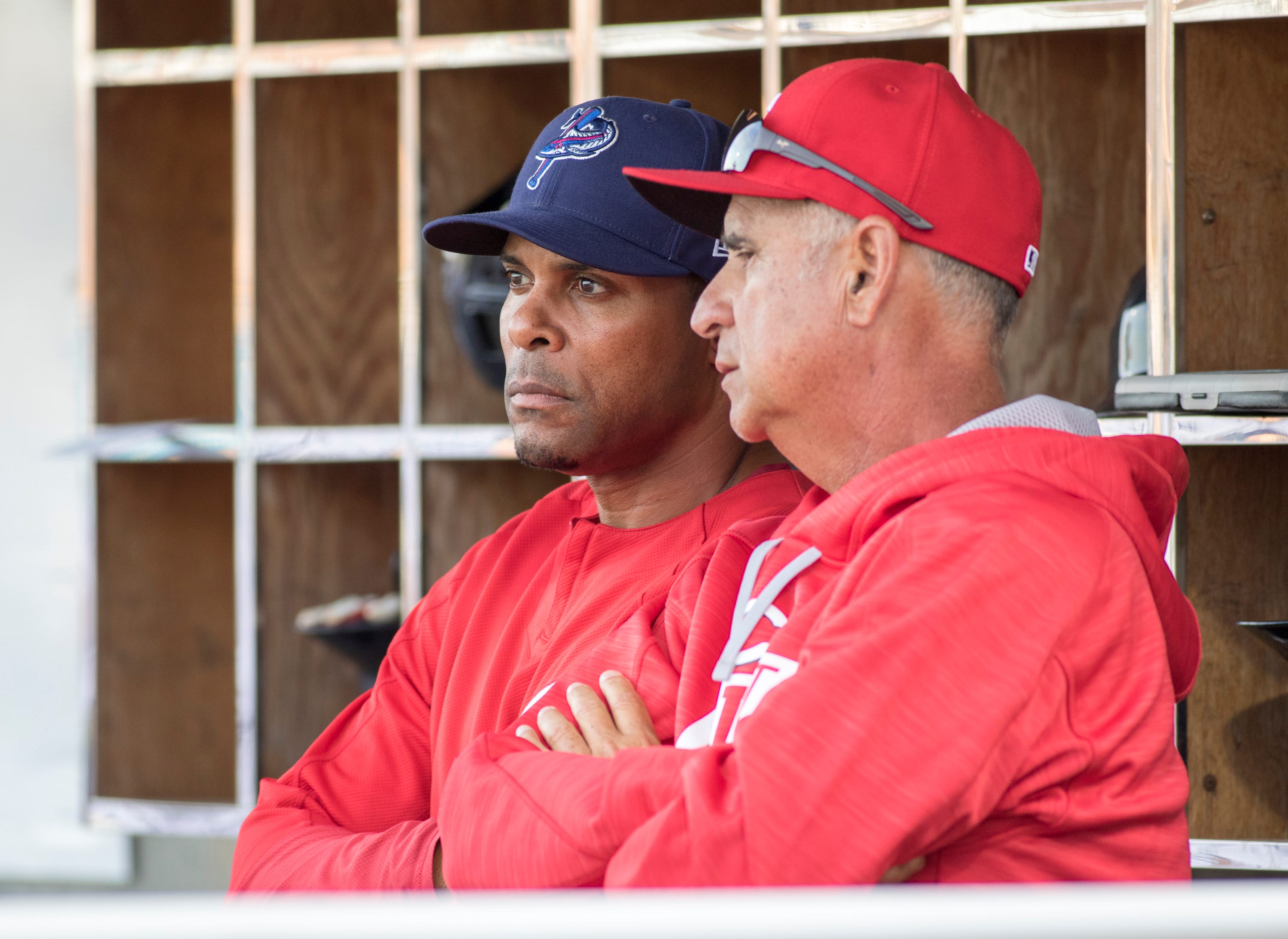 Reds Hall of Famer Barry Larkin works with Blue Wahoos