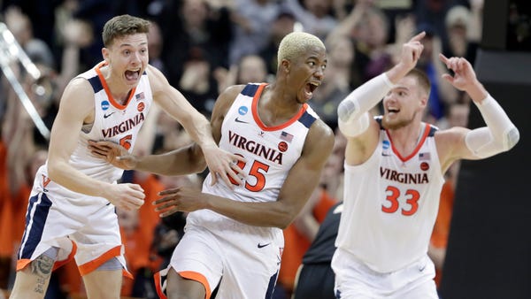 March Madness: Virginia survives wild game...