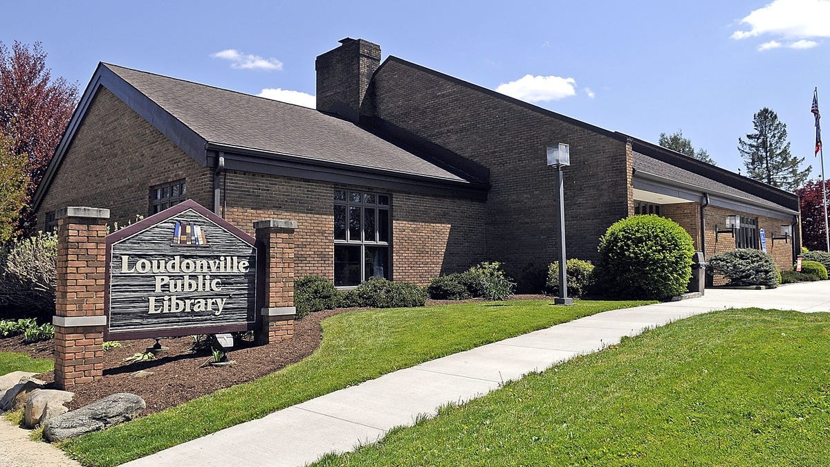 Water spray, chocolate, book sale at Loudonville Library in July