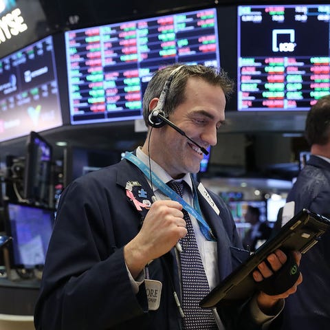 The Dow Jones Industrial Average closed out a tumu