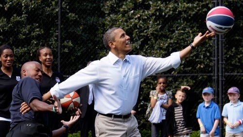 barack playing basketball