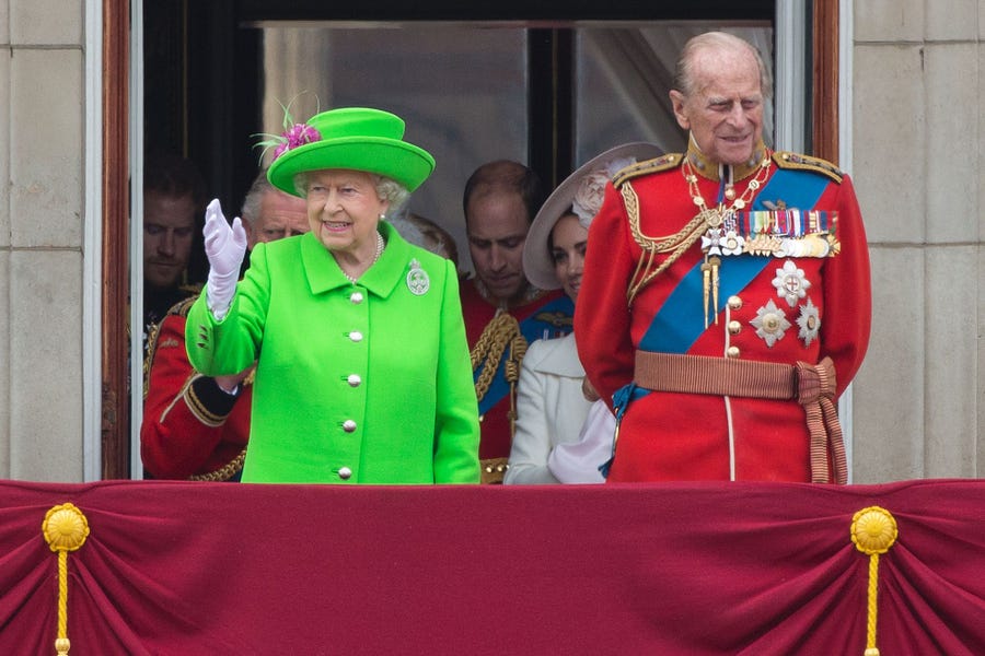 In June 2016,Queen Elizabeth II and Prince Philip wave from the balcony of Buckingham Palace during the annual Trooping the Colour ceremony.