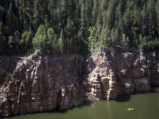 Helen Boemmels of Phoenix kayaks on the C.C. Cragin Reservoir north of Payson.