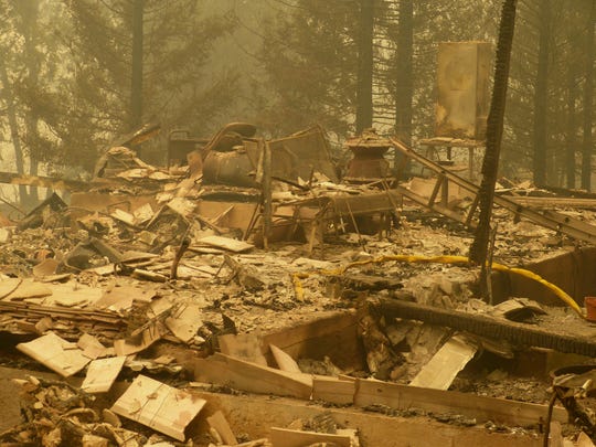 A Pollard Flat house is left in ruins after being destroyed in the Delta fire.