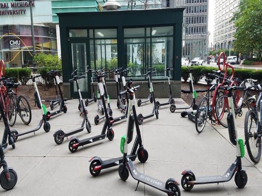 On Wednesday, October 10, 2018, many scooters are parked in the downtown area, outside the Chase Tower, in downtown Detroit.