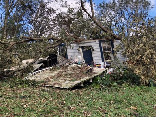 A large oak tree, which fell Oct. 10, 2018, during Michael Hurricane, practically destroyed the Gretna, Florida, house where Steve Sweet was killed and his wife was injured.