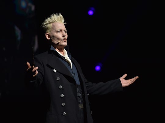 Johnny Depp showed up in character as Grindelwald during a Warner Bros. panel at Comic Con in San Diego this summer.