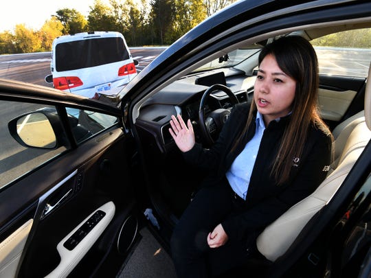 Denso engineer and driver Amanda Dango just before a demonstration of this 2016 Lexus RX equipped with its Advanced Driver-Assistance System (ADAS) technology Thursday, Oct. 18, 2018 at one of their Alcoa plants. 