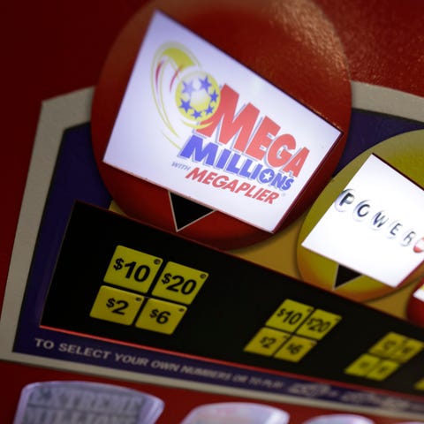 The Mega Millions game is shown on a win station...