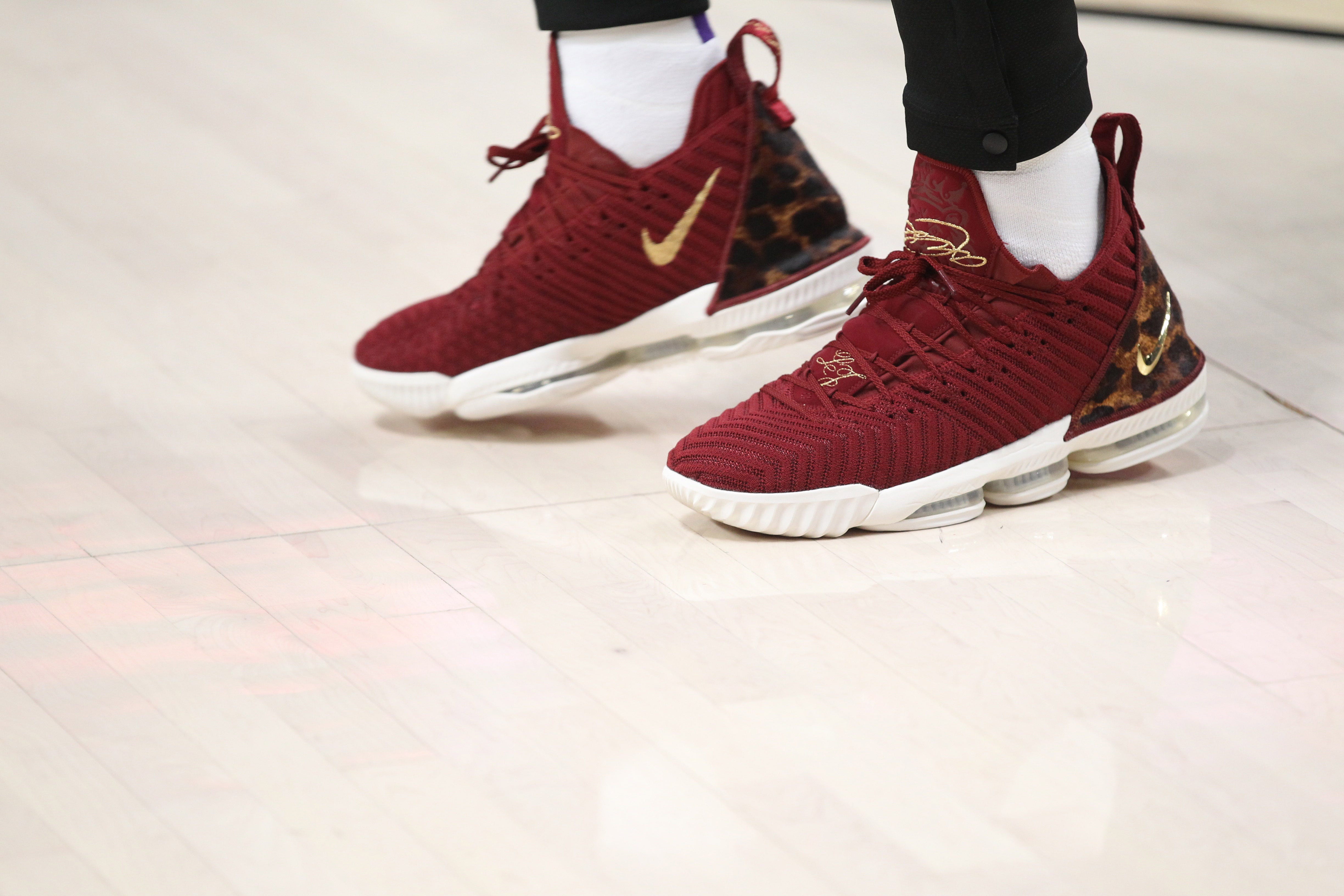 LeBron James: Gold and burgundy shoes 