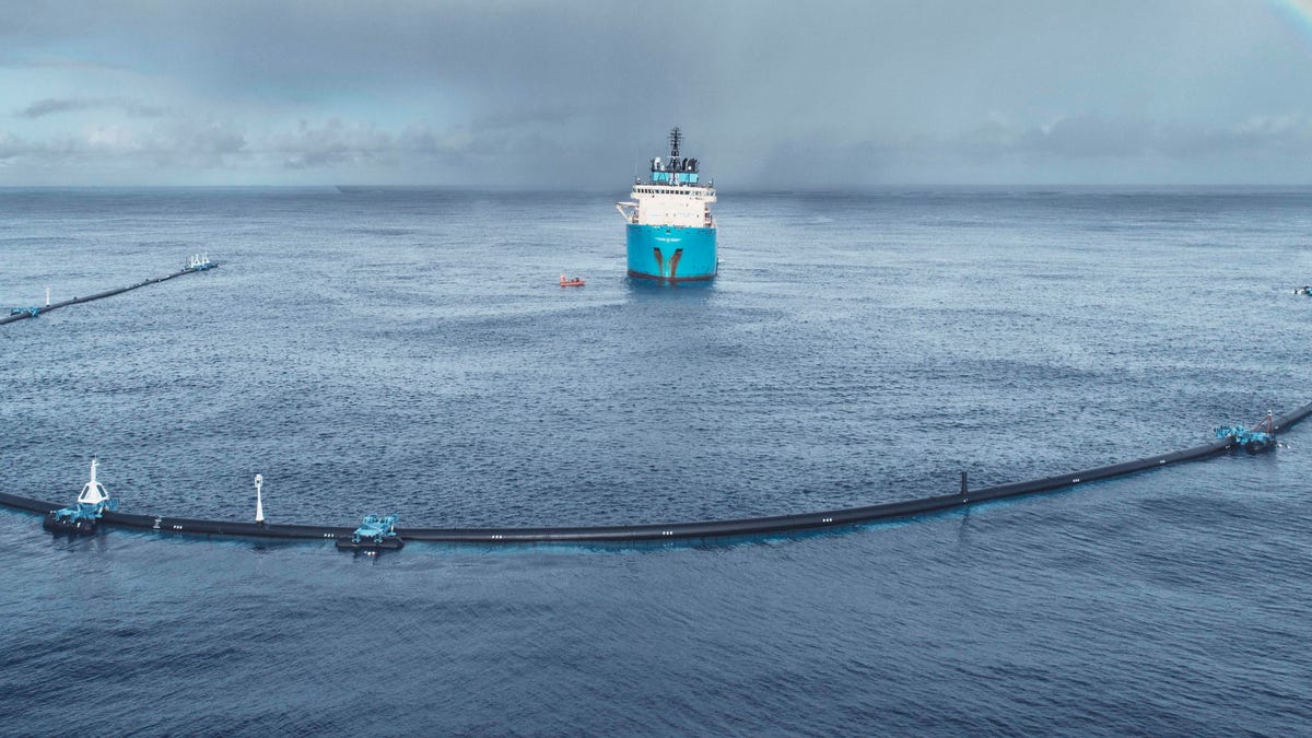 The Ocean Cleanup system deployed in the Great Pacific Garbage Patch to sweep up plastic trash at the ocean's surface.