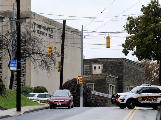 Police respond to an active shooter situation at the Tree of Life synagogue on Wildins Avenue in the Squirrel Hill neighborhood of Pittsburgh, Pa., on Saturday.