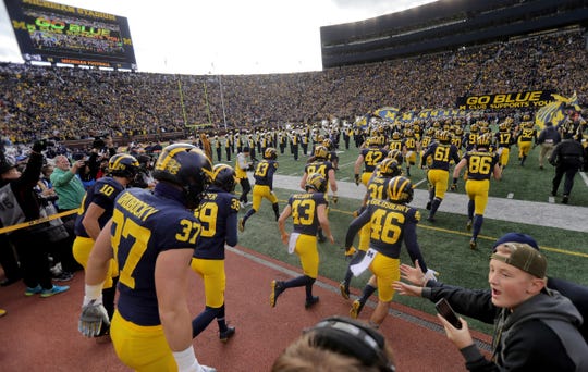 The Michigan football team takes the field prior to the start of their game against Penn State on Saturday, Nov. 3, 2018 at Michigan Stadium.