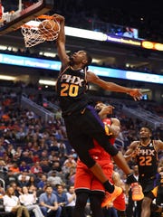 Nov 2, 2018: Phoenix Suns forward Josh Jackson (20) slam dunks the ball in the fourth quarter against the Toronto Raptors at Talking Stick Resort Arena.