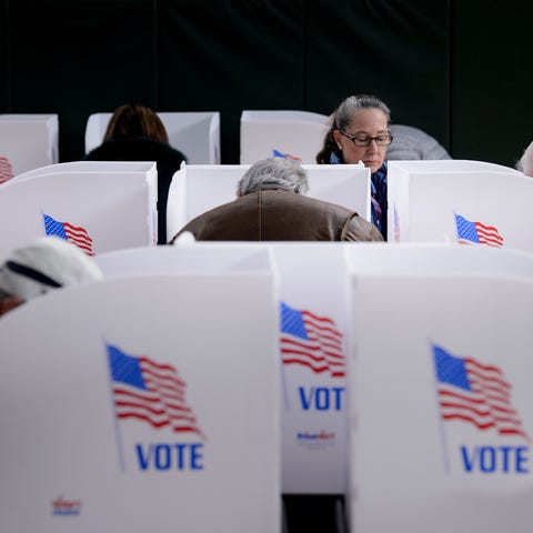 People cast their ballots at a community center...