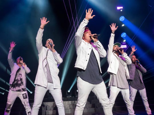 Backstreet Boys members Brian Littrell, left, Kevin Richardson, AJ Carter, AJ McLean and Howie Dorough perform in Wantagh, New York, in July. Their Las Vegas residency concludes in April, ahead of a massive world tour.