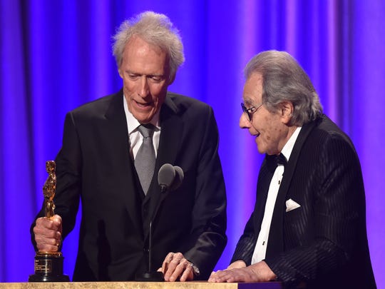 Clint Eastwood presents Argentine composer Lalo Schifrin (right) at the 10th annual Governor's Awards ceremony.