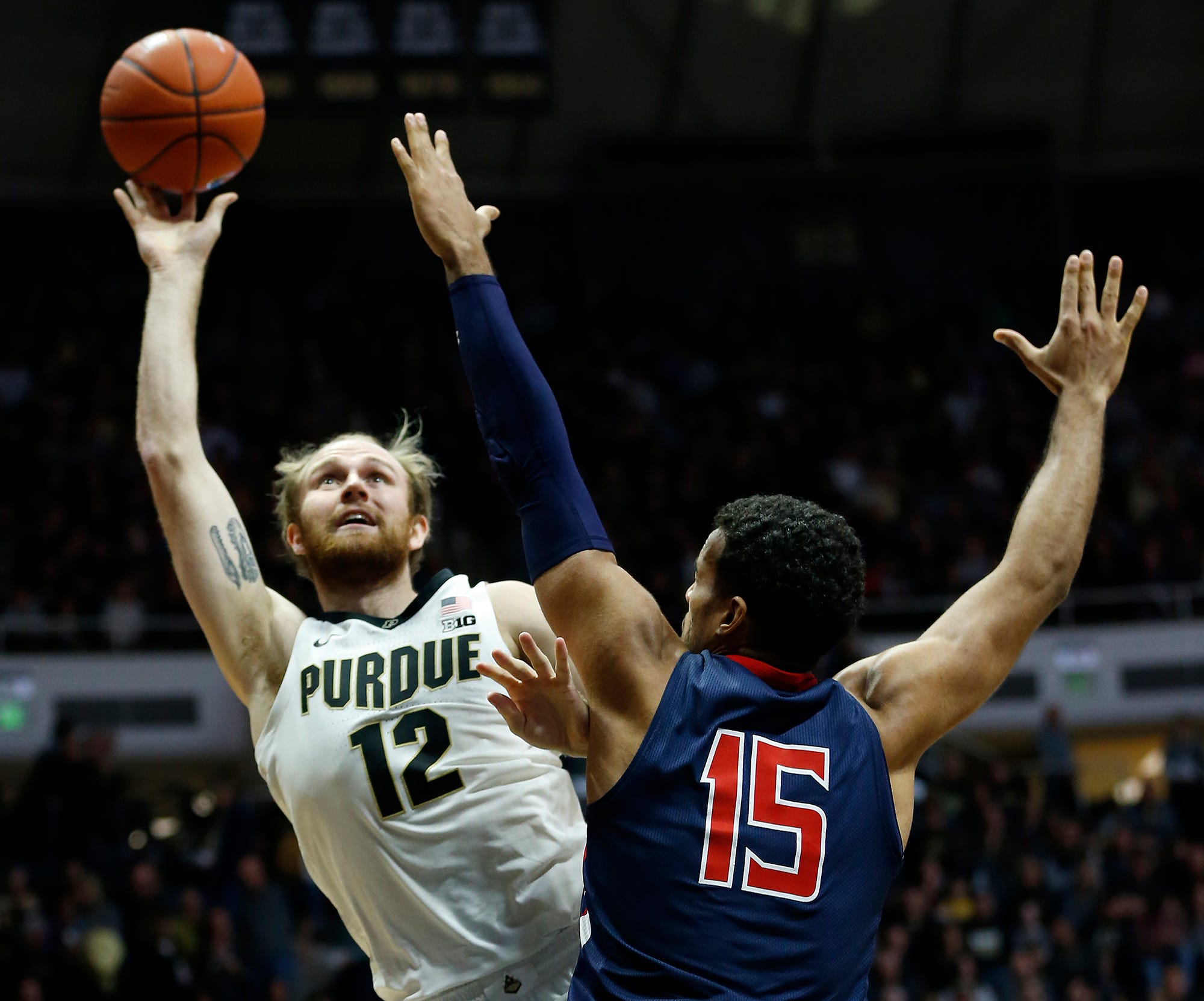 Purdue Basketball S Evan Boudreaux Father Bonded By Dinosaur Tattoo