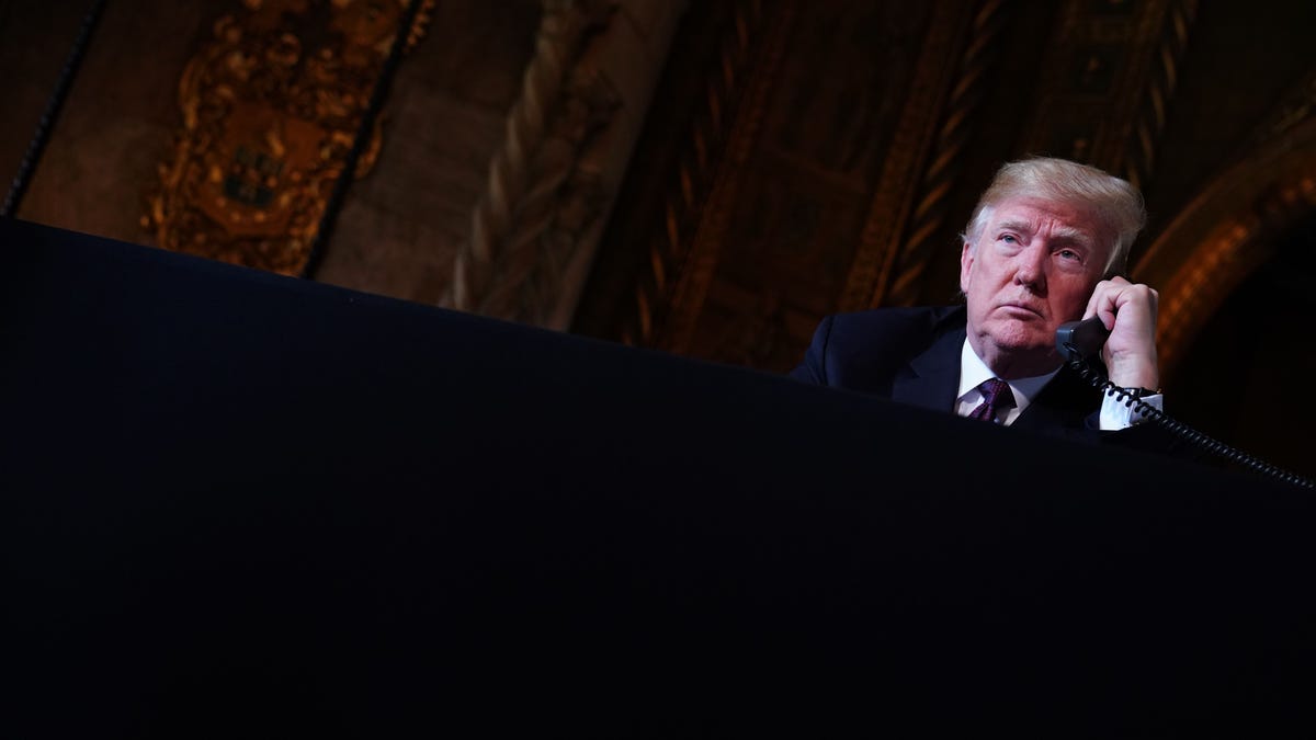 President Donald Trump speaks to members of the military from his Mar-a-Lago resort in Palm Beach, Florida, on Thanksgiving Day, Nov. 22, 2018.