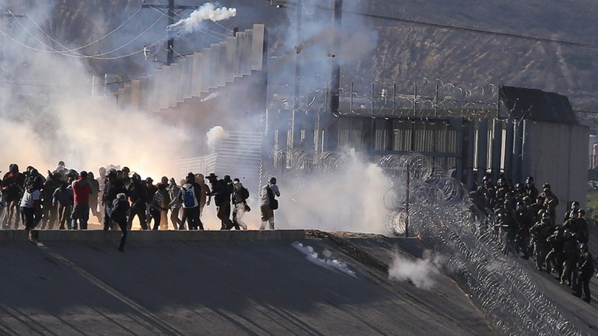 The view of tear gas that U.S. border police used to prevent groups of people from crossing El Chaparral border crossing in Tijuana on Sunday.