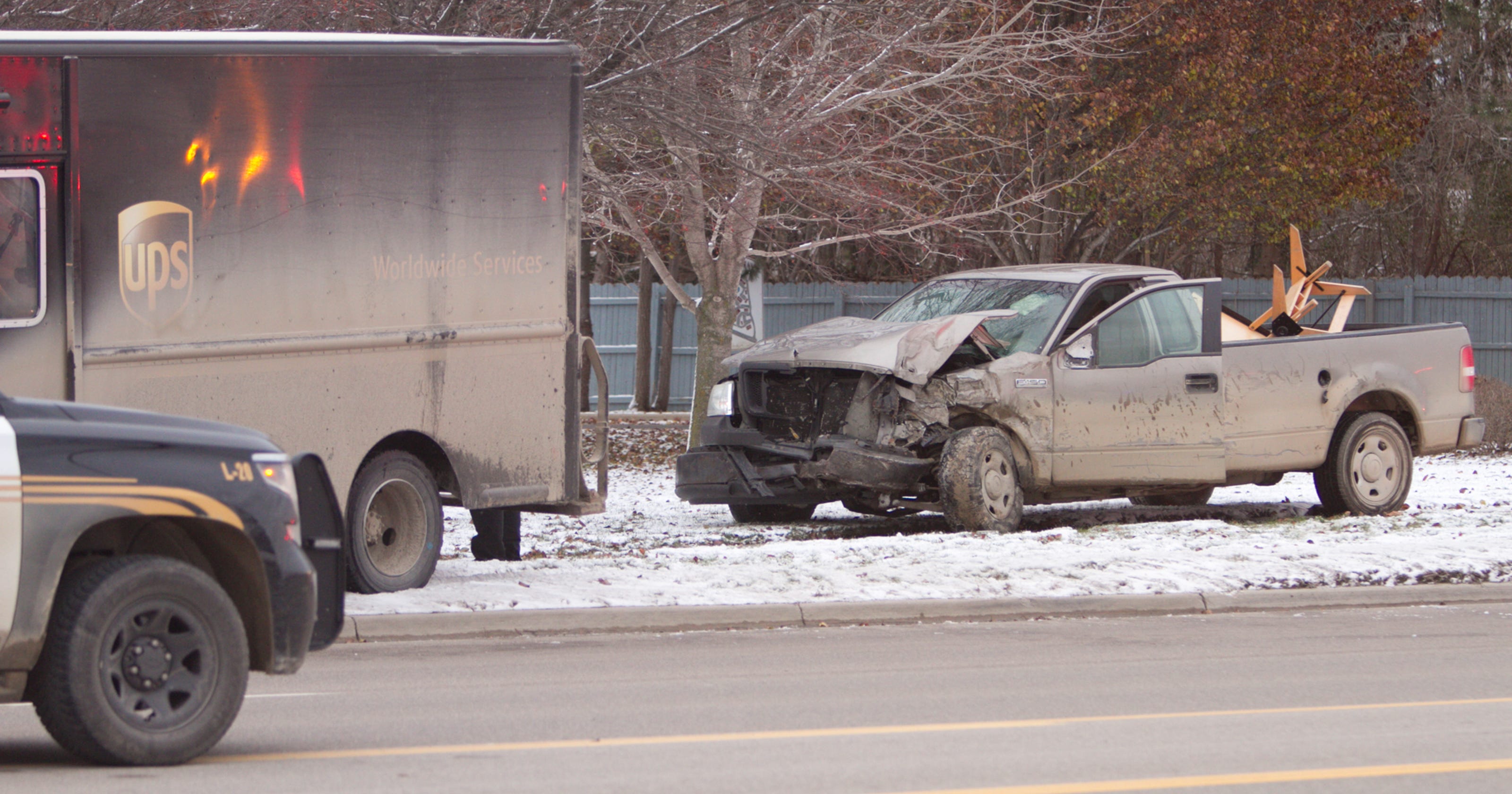 Two injured after UPS truck, pickup collide on Grand River Avenue