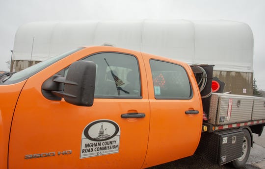 A truck is parked outside the Ingham County Road Commission's salt storage barn in Lansing on Thursday, Dec. 20, 2018.