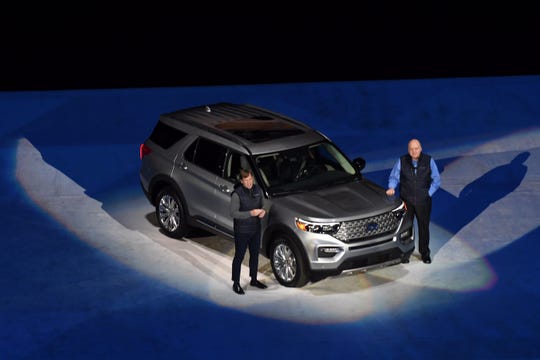 Ford Motor Co.'s COO-designate Jim Farley, left, and CEO Jim Hackett introduce the 2020 Explorer SUV.