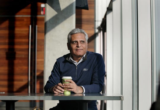 Kumar Galhotra, president of Ford North America, in the cafeteria at Ford World Headquarters in Dearborn.