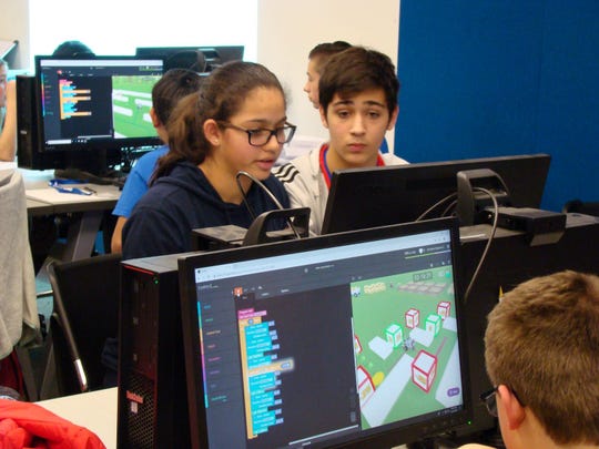 Maya Dias (left) and Aaron Richman were among four Edison 8th graders who advanced to the finals in CoderZ online challenges and were invited to participate in two-person teams in the 2018 New Jersey Cyber Robotics Coding Competition Finals on Dec. 14 at NJIT.