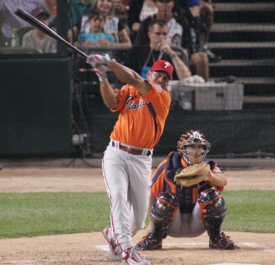 Bobby Abreu watches one of his 11 home runs in the final round  of  the  Home Run Derby on  July 11, 2005 at Comerica Park. Abreu hit a total of 41 home runs for the night.