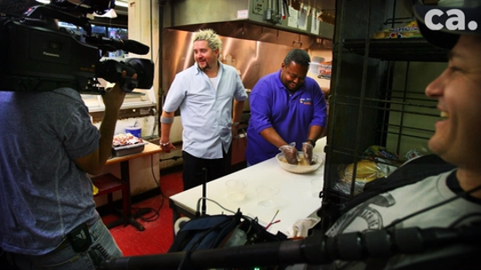 Guy Fieri visits Uncle Lou's Fried Chicken for his Food Network hit, Diners, Drive-Ins and Dives in 2008.