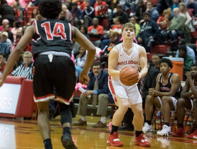 Bosse's Kolten Sanford (45) takes a 3-point shot during the Harrison vs Bosse game at Bosse High School Tuesday, Feb. 12, 2019. 