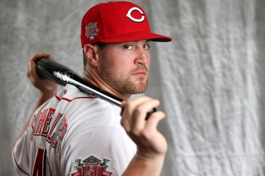 Cincinnati Reds right fielder Scott Schebler (43) poses for a portrait on picture day, Tuesday, Feb. 19, 2019, at the Cincinnati Reds spring training facility in Goodyear, Arizona.