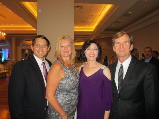 Dave and Cindy Comeaux with Nanette and Joe Heggie at a Krewe of Bonaparte party.