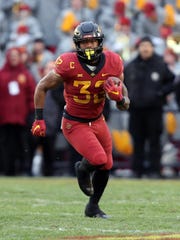 Iowa State Cyclones running back David Montgomery (32) runs the football against the Baylor Bears at Jack Trice Stadium.