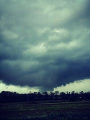 This handout image provided by Justin Merritt shows a tornado in Dothan, Alabama on March 3, 2019. - A tornado killed 14 people and caused "catastrophic" damage in the southern US state of Alabama on March 3, a local sheriff said.