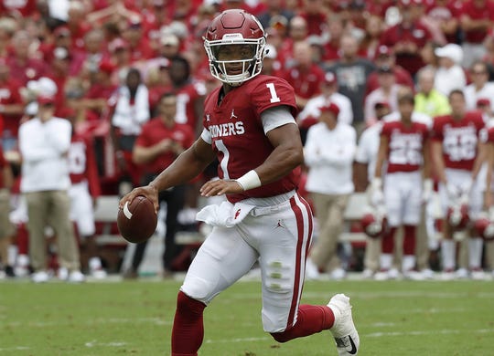 Quarterback Kyler Murray of Oklahoma seeks a receiver against UCLA on September 8, 2018 in Norman, Okla.