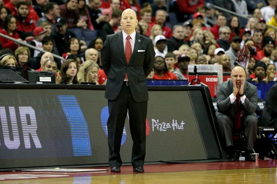 Head coach Mick Cronin observes the team in the first half.