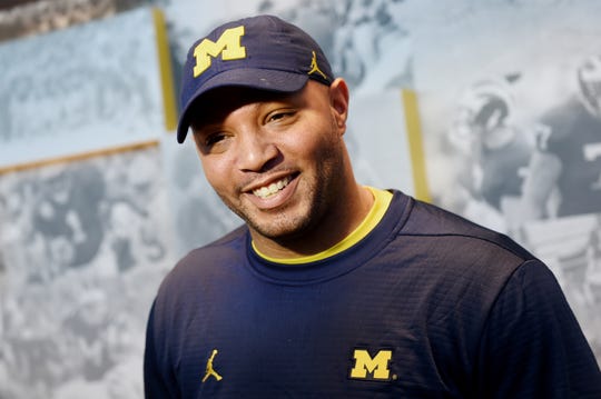 Michigan football offensive coordinator Josh Gattis smiles as he speaks to the media during a press conference at Schembechler Hall on Friday, March 22, 2109.