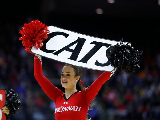 First round: A Cincinnati Bearcats cheerleader during the game against the Iowa Hawkeyes.