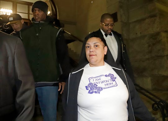 Michelle Kenney, center, mother of Antwon Rose II, leaves the Allegheny County Courthouse with supporters after hearing the verdict of not guilty of all Michael's indictment. Rosfeld, former police officer in East Pittsburgh, Pennsylvania, Friday, March 22, 2019.