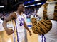 Round of 32: LSU forward Emmitt Williams celebrates the win over Maryland with the Tigers mascot.